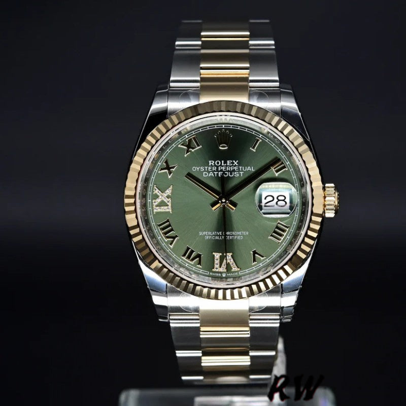 Detailed view of the Rolex 126233 Olive Green dial featuring 18k yellow gold hands, Roman numerals (or baton markers), and date window.
