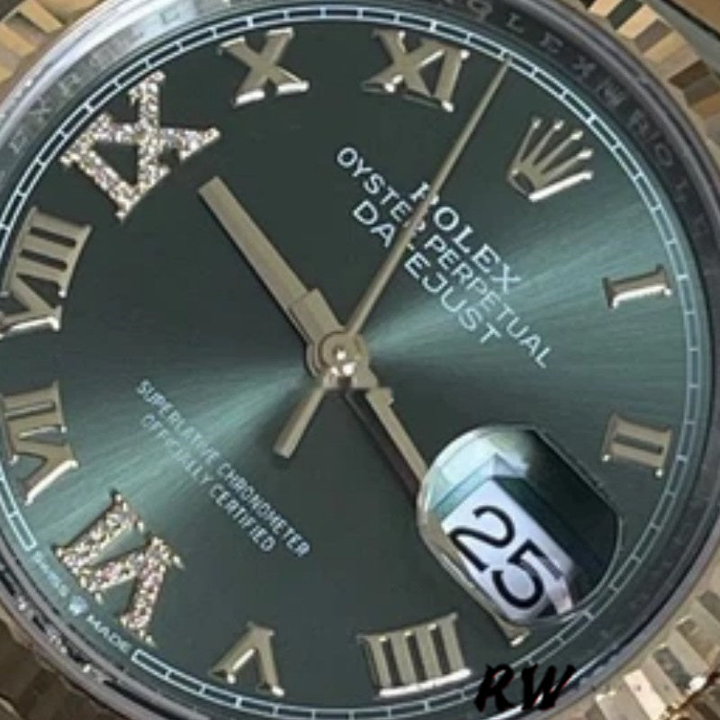 Close-up of the 18k yellow gold fluted bezel and screw-down crown on the two-tone Rolex Datejust 36 Ref. 126233.