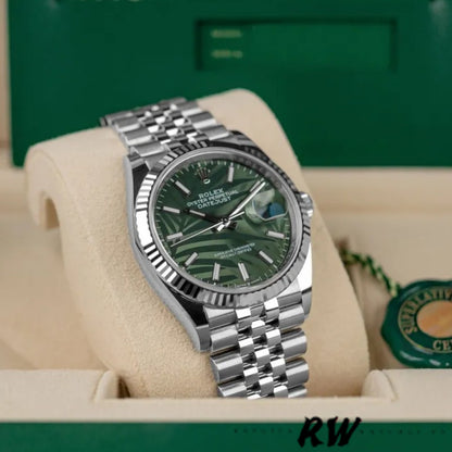 Close-up of the Rolex 126234 Olive Green Palm Motif dial, showcasing the laser-etched palm leaf pattern and luminescent markers