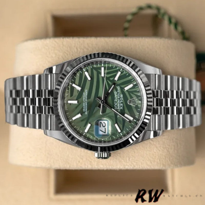 18k white gold fluted bezel on a Rolex Datejust 36 Ref. 126234, highlighting the classic light-reflecting luxury finish.