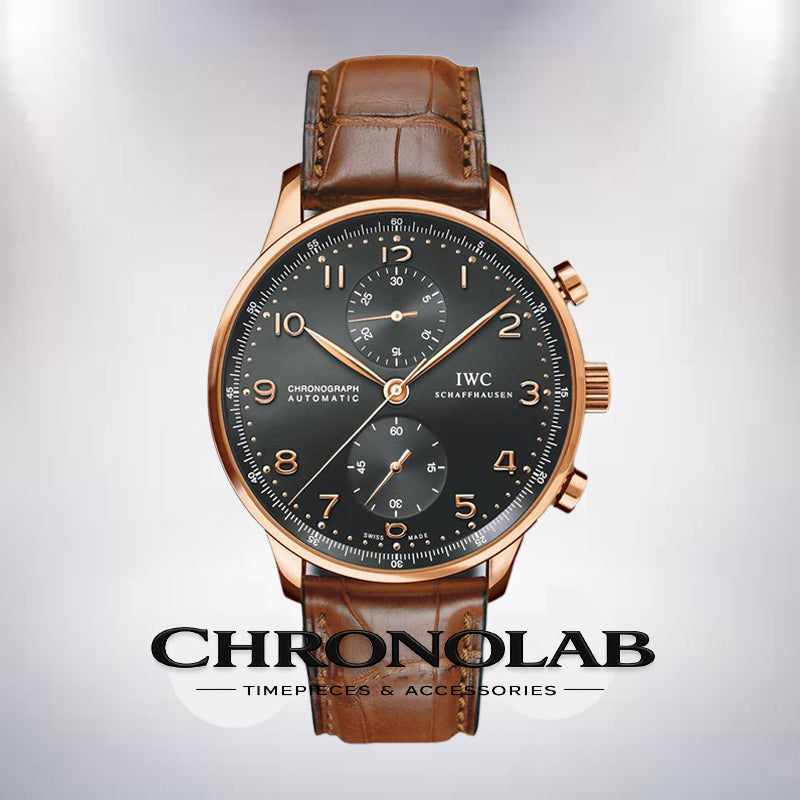 IWC Portuguese Rattrapante IW371210 stainless steel 41mm watch with silver dial, rose gold numerals, and black leather strap.