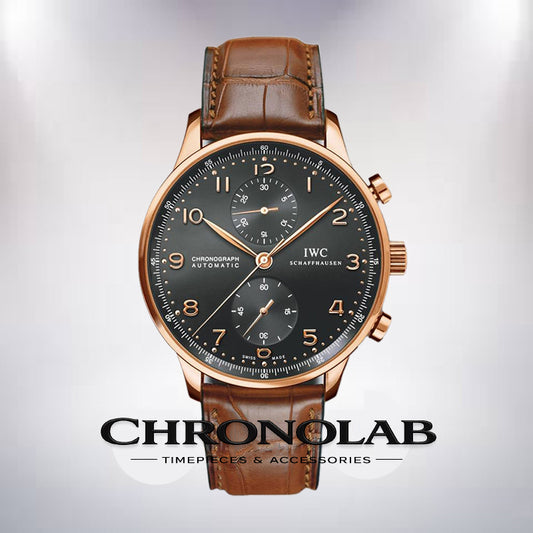 IWC Portuguese Rattrapante IW371210 stainless steel 41mm watch with silver dial, rose gold numerals, and black leather strap.