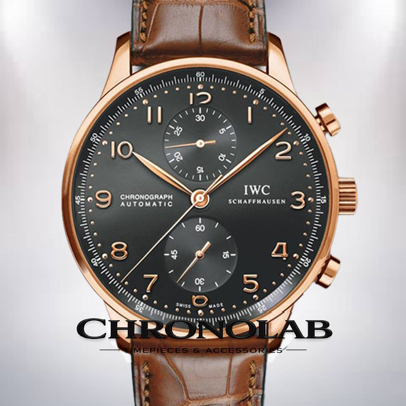 Detailed view of the IWC 371210 silver dial with rose gold Arabic numerals and leaf-shaped hands (feuille hands).
