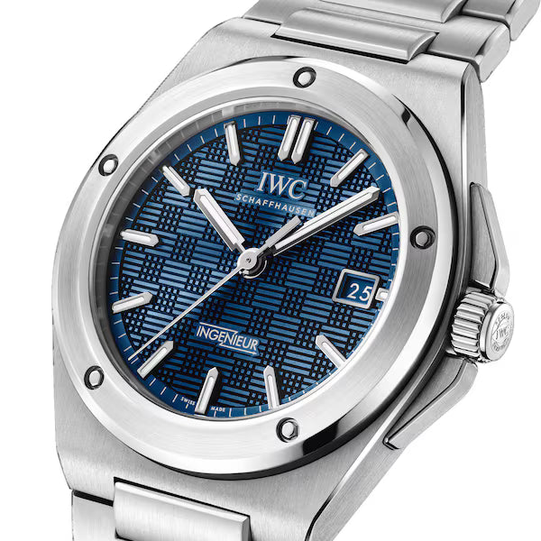 Detailed view of the IWC IW328907 Aqua dial featuring the distinctive checkerboard grid structure and luminescent baton markers.