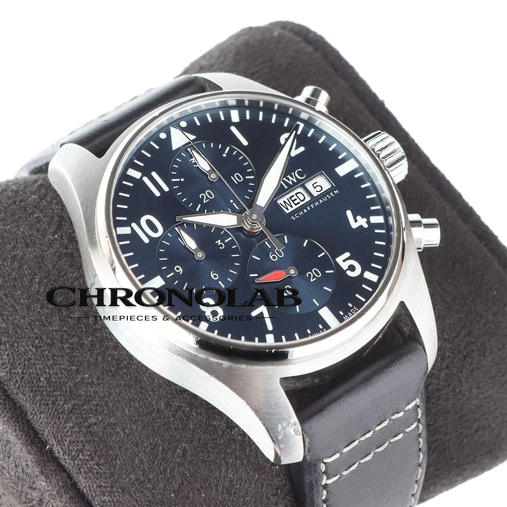 Blue leather strap of the IWC Pilot 41 showing the EasX-CHANGE quick-release system and stainless steel pin buckle.