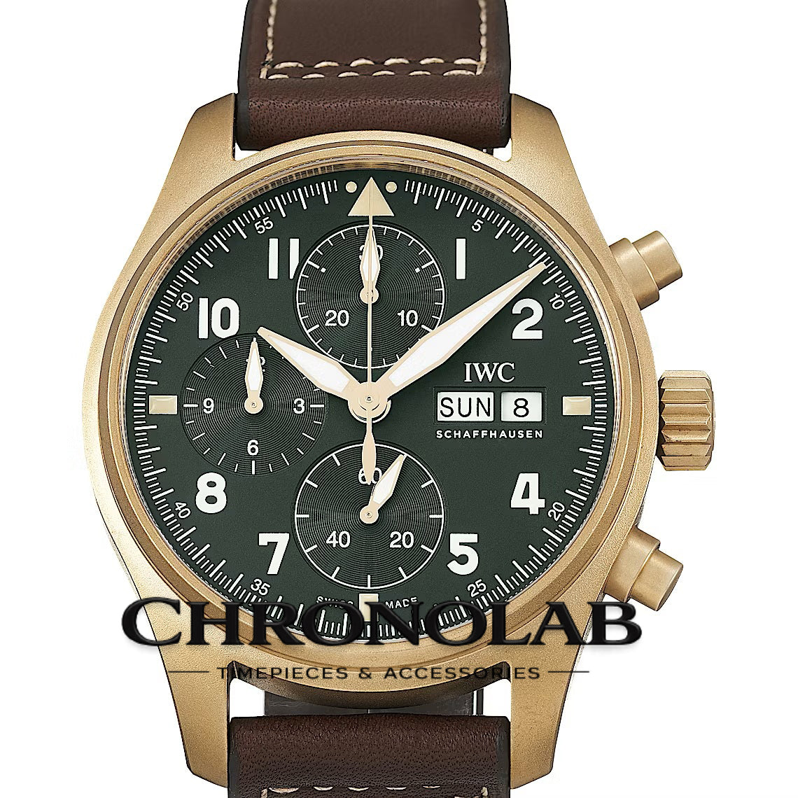 Close-up of the olive green Spitfire dial featuring bronze-toned hands, day-date window, and vintage-style luminous Arabic numerals