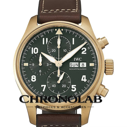 Close-up of the olive green Spitfire dial featuring bronze-toned hands, day-date window, and vintage-style luminous Arabic numerals
