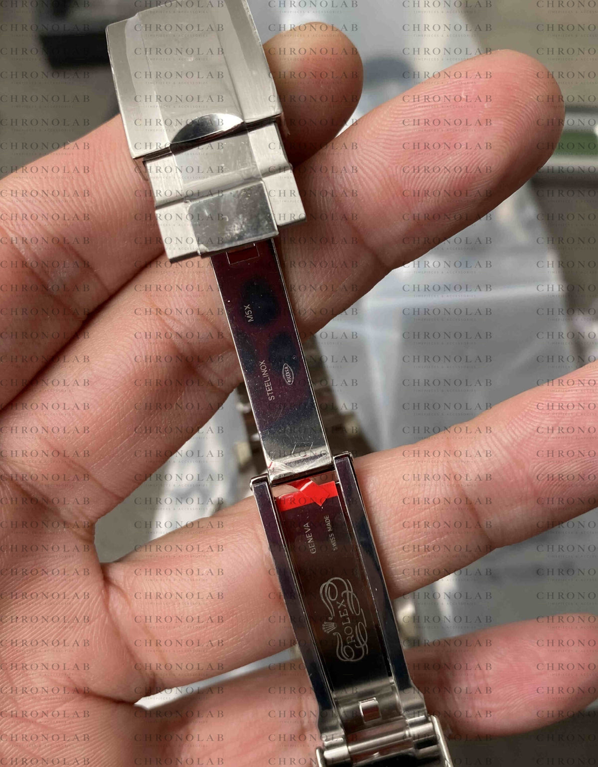 Rear view showing the 904L solid stainless steel caseback and brushed Oyster bracelet links on Rolex Daytona 116500 Clean Factory