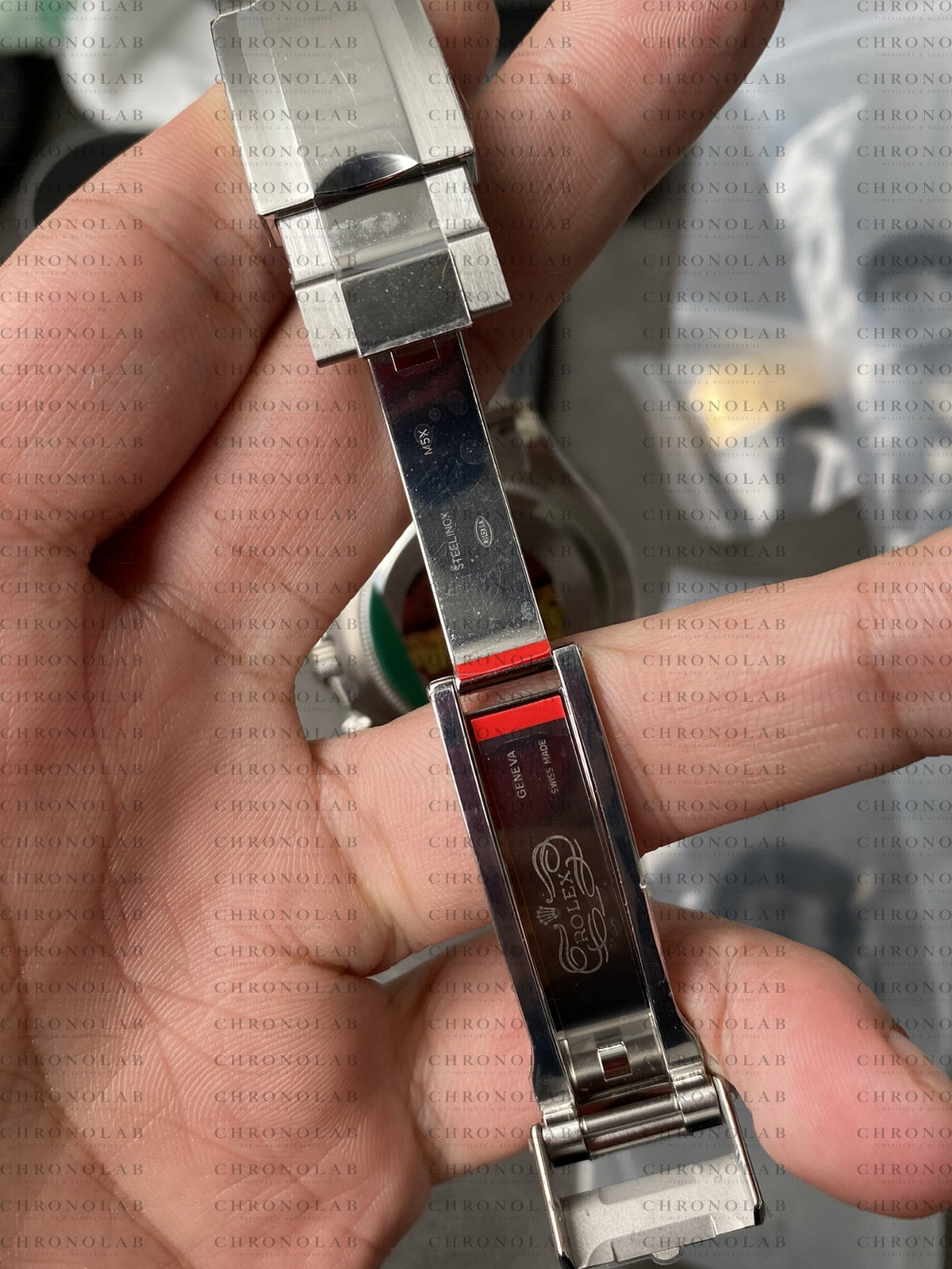 Side profile of the Oysterlock safety clasp showcasing the Easylink 5mm comfort extension adjustment on Rolex Daytona 126500LN Clean Factory