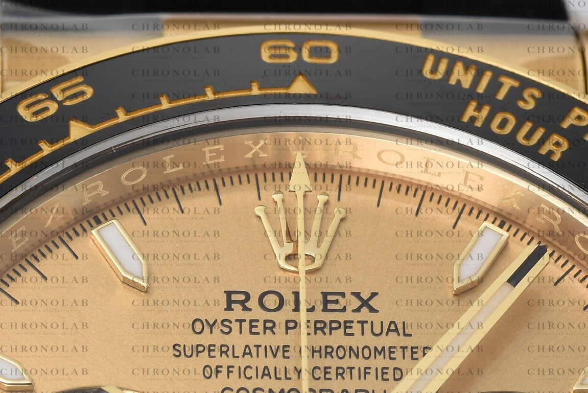 Macro view of the printed text, Rolex coronet logo, and fine dial texturing on the Golden dial of Rolex Daytona 126518LN Clean Factory