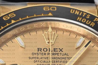 Macro view of the printed text, Rolex coronet logo, and fine dial texturing on the Golden dial of Rolex Daytona 126518LN Clean Factory