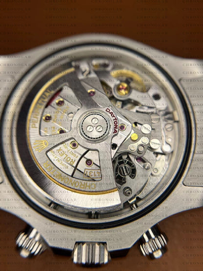 Side angle close-up of the automatic winding gear train on the SH4131 super clone movement from Clean Factory view 4