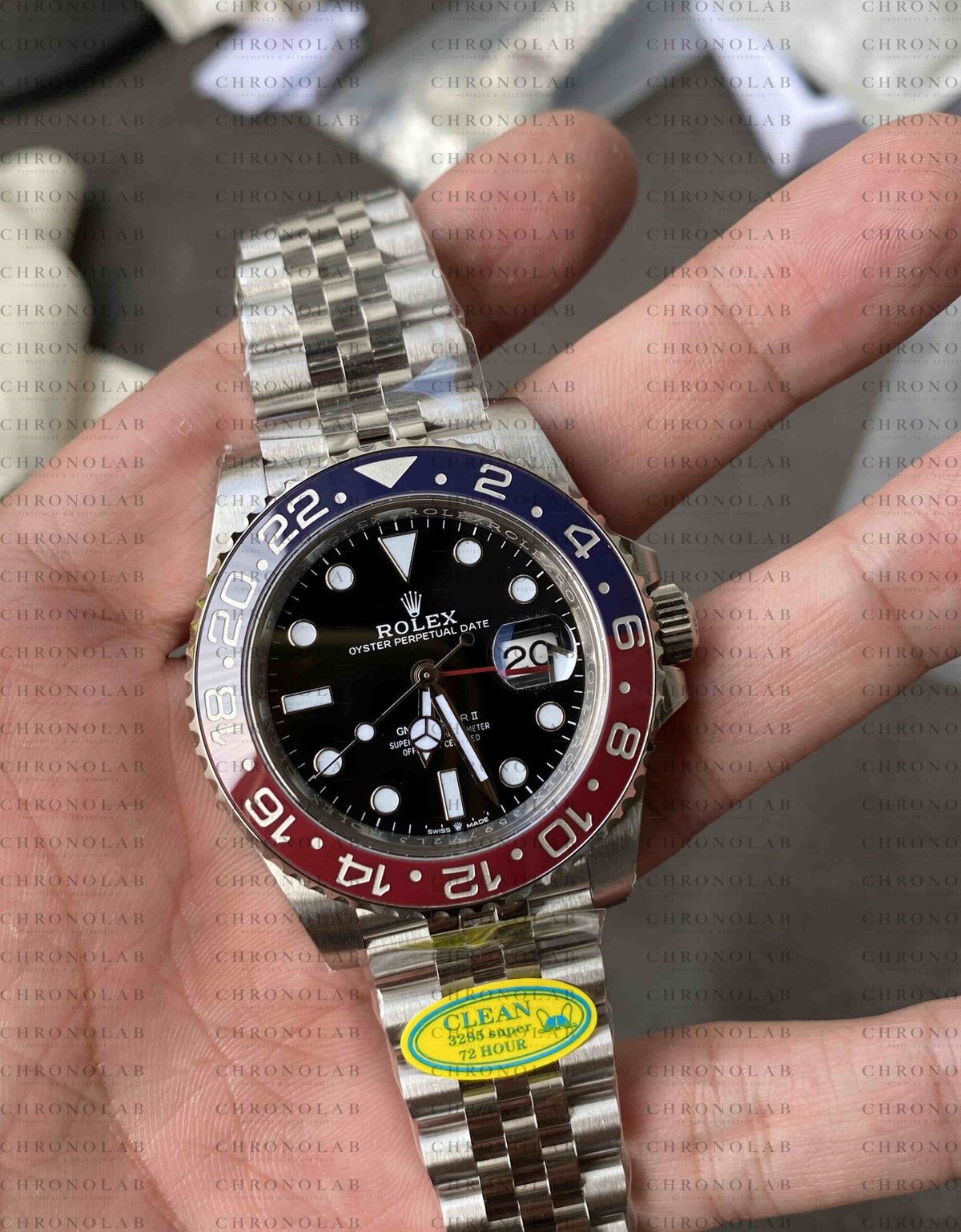 Close-up wristshot showcasing the red and blue Cerachrom ceramic bezel and glossy black dial on Rolex GMT-Master II Pepsi Clean Factory V3