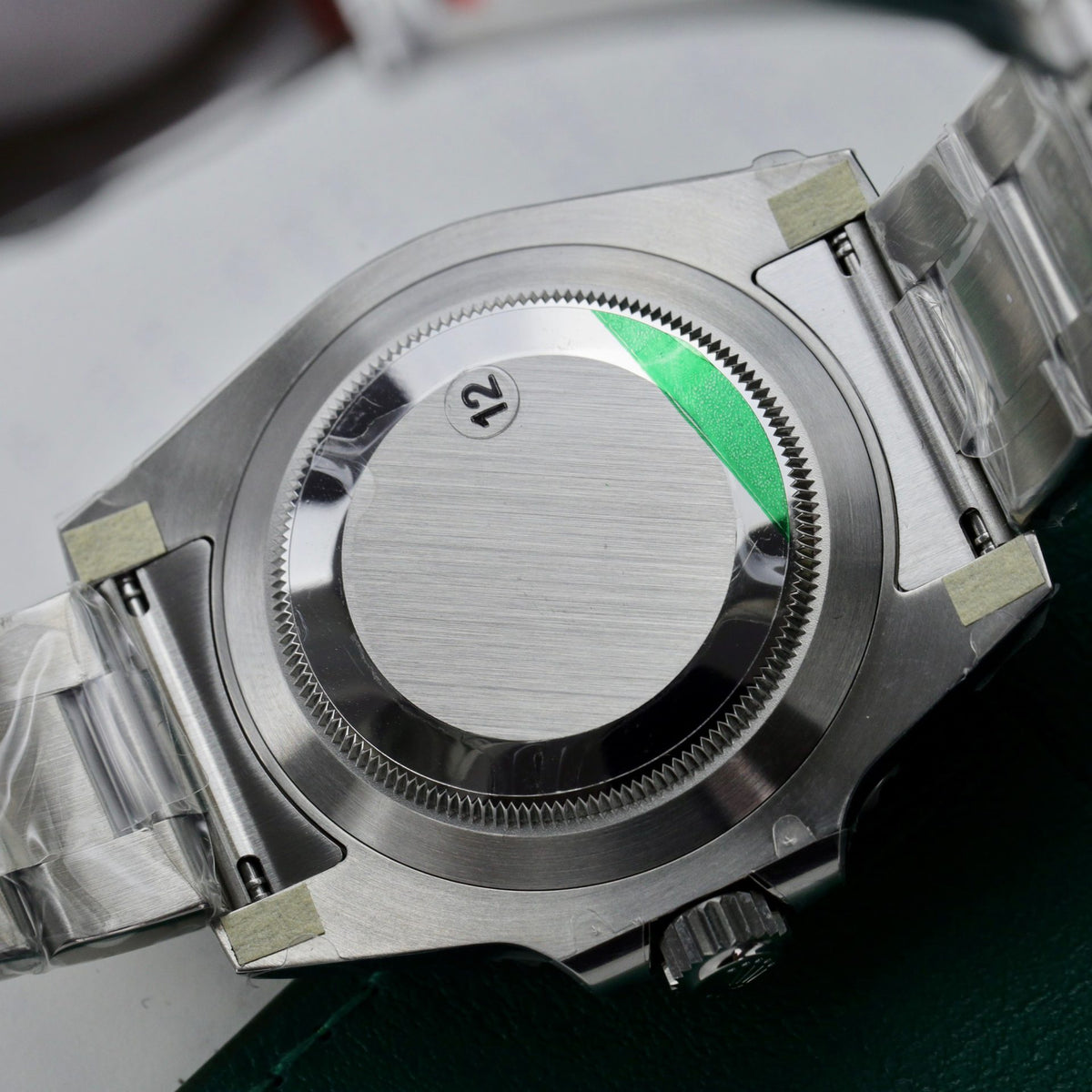 Detailed finishing and engraving inside the folding Oysterlock clasp Rolex Submariner Date 126610LV V3 replica